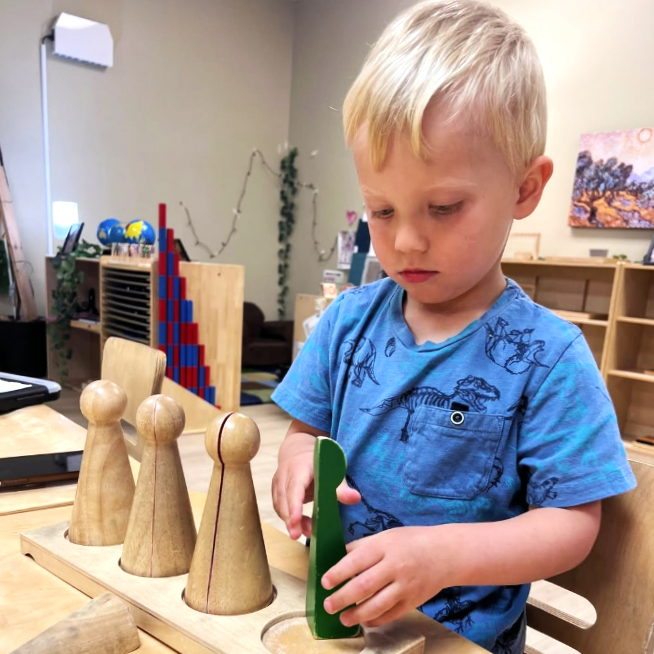 student with blocks